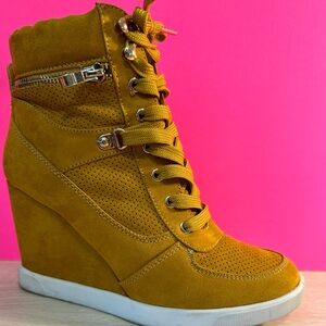 Shoe Dazzle Size 8 wedge sneakers, color  is yellow mustard.